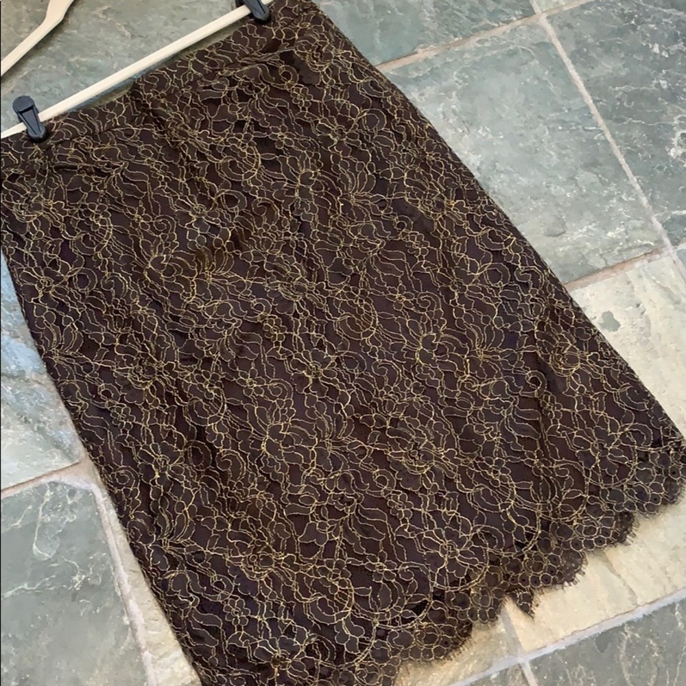 Black lace skirt with gold thread detail